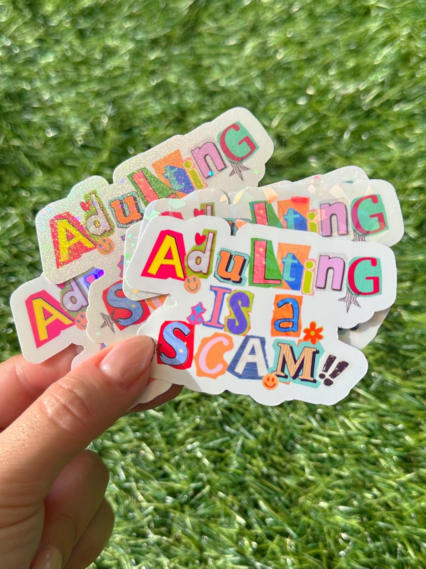 Adulting Is a Scam Sticker | Funny Sarcastic Vinyl Decal for Laptop & Water Bottle