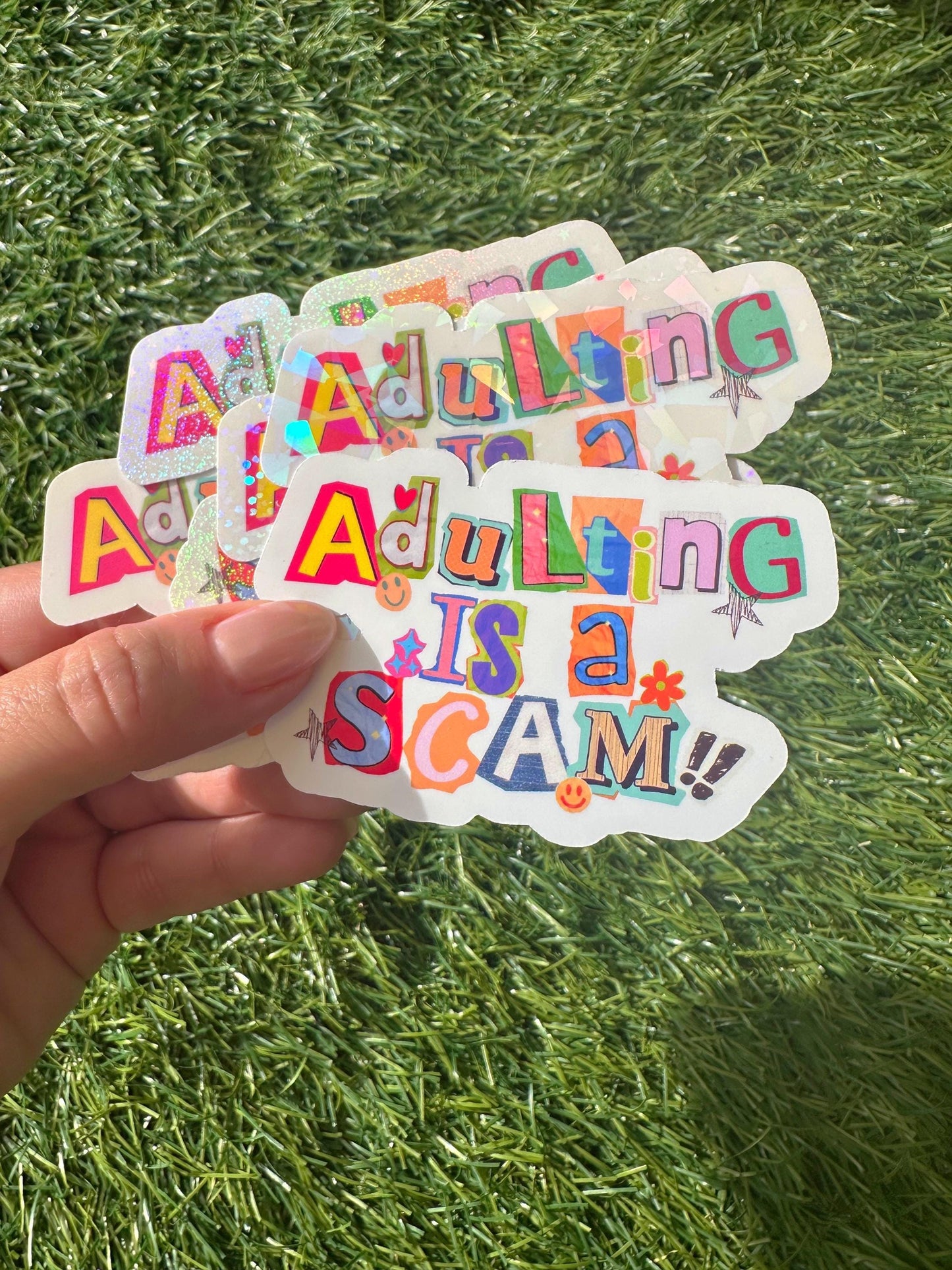 Adulting Is a Scam Sticker | Funny Sarcastic Vinyl Decal for Laptop & Water Bottle